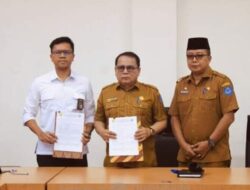 Sekda Tandatangani Serah Kelola SPAM IKK Bilah Hilir
