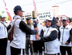 Plt. Bupati Labuhanbatu Sambut Kirab Api PON ke-21 Aceh-Sumatera Utara